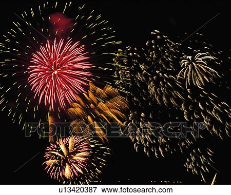 Colorful fireworks in sky at night View Large Photo Image Stock Photo - Colorful fireworks in sky at night. Fotosearch