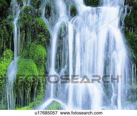 Waterfall and rocks covered by moss View Large Photo Image Stock Photo - Waterfall and rocks covered by moss. Fotosearch