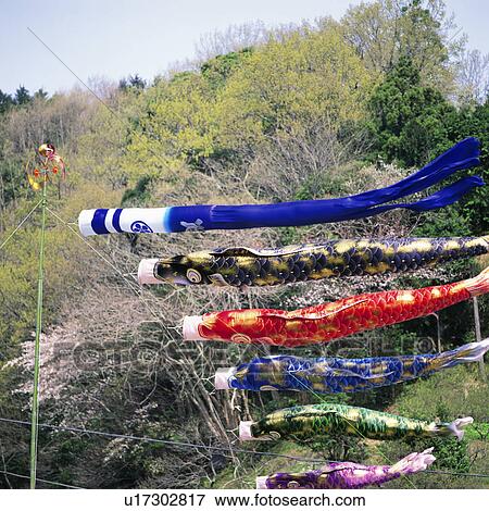 Stock Photo - Windsocks with trees in background. Fotosearch
