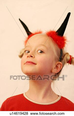 Girl in halloween costume as a devil, portrait View Large Photo Image Stock Photo - Girl in halloween costume as a devil, portrait. Fotosearch