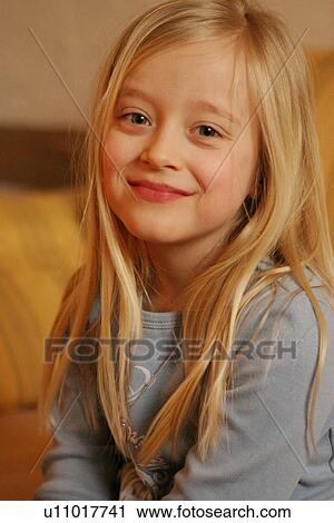Portrait of girl with long blond hair, smiling View Large Photo Image Stock Image - Portrait of girl with long blond hair, smiling. Fotosearch