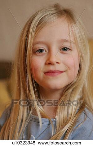 Portrait of girl with long blond hair, smiling View Large Photo Image Stock Photography - Portrait of girl with long blond hair, smiling. Fotosearch