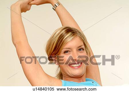 Woman stretching View Large Photo Image Stock Photography - Woman stretching. Fotosearch