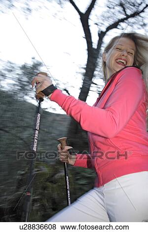 Stock Photo - Female Nordic walker. Fotosearch