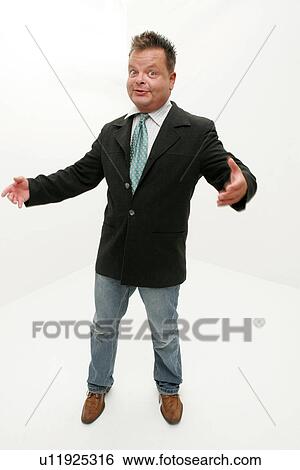 Overweight man wearing jeans, jacket and tie, full length View Large Photo Image Stock Photograph - Overweight man wearing jeans, jacket and tie, full length. Fotosearch