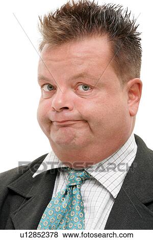 Stock Photo - Overweight man wearing suit and tie, portrait. Fotosearch