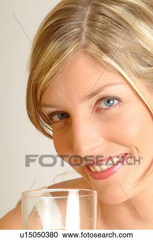 Portrait of Woman drinking juice View Large Photo Image Stock Image - Portrait of Woman drinking juice. Fotosearch