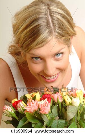 Portrait of Woman with bouquet of roses View Large Photo Image Picture - Portrait of Woman with bouquet of roses. Fotosearch