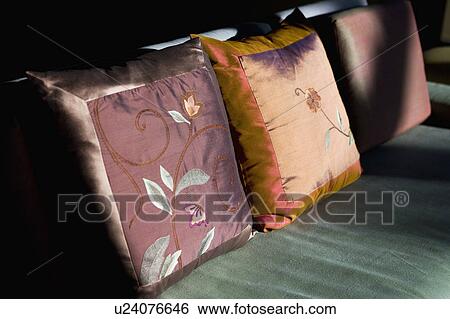Contemporary Pillows on Green Cushion View Large Photo Image Stock Photograph - Contemporary Pillows on Green Cushion. Fotosearch
