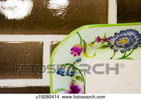 Picture - Detail of colorful soap dish with soap. Fotosearch