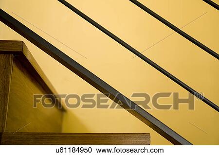 Detail of Modern Hardwood Stairwell and Yellow Wall View Large Photo Image Stock Image - Detail of Modern Hardwood Stairwell and Yellow Wall. Fotosearch