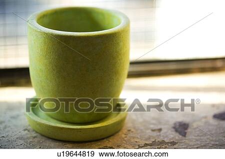 Stock Photo - Green cup on saucer. Fotosearch