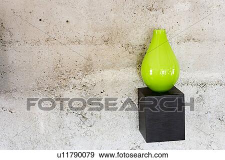 Green vase on wood shelf View Large Photo Image Stock Photo - Green vase on wood shelf. Fotosearch