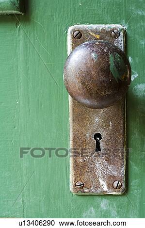 Old doorknob on green door View Large Photo Image Stock Image - Old doorknob on green door. Fotosearch