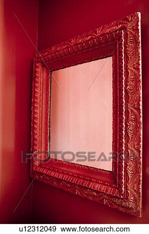Stock Photo - Red Mirror and Wall. Fotosearch