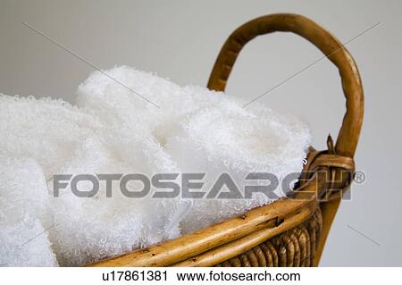 Basket of white towels View Large Photo Image Stock Image - Basket of white towels. Fotosearch