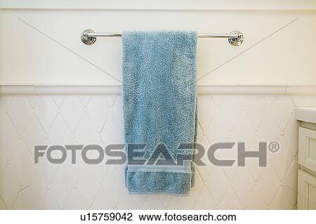 Stock Image - Blue Towel on Towel Rack. Fotosearch