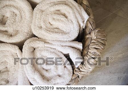 Detail of rolled towels in basket. View Large Photo Image Stock Photo - Detail of rolled towels in basket.. Fotosearch