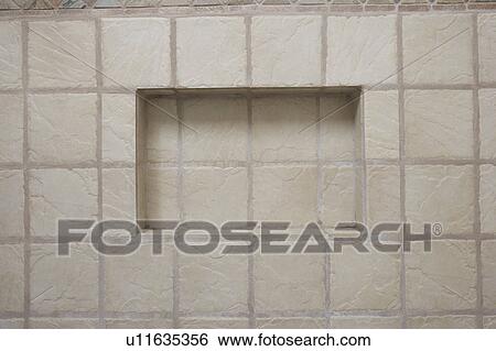 Stock Photograph - Detail of tile shelf in a shower. Fotosearch
