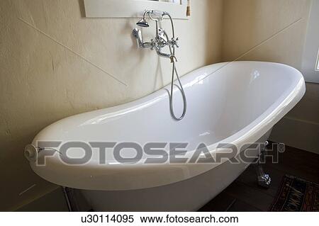 Spanish Style Claw Foot Tub and Chrome Faucet View Large Photo Image Stock Photography - Spanish Style Claw Foot Tub and Chrome Faucet. Fotosearch