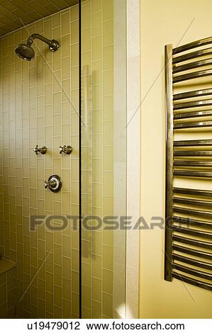 Towel Warmer on Wall next to Tile Shower View Large Photo Image Stock Image - Towel Warmer on Wall next to Tile Shower. Fotosearch