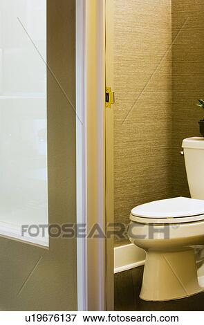 Stock Photo - View of Toilet through Doorway. Fotosearch