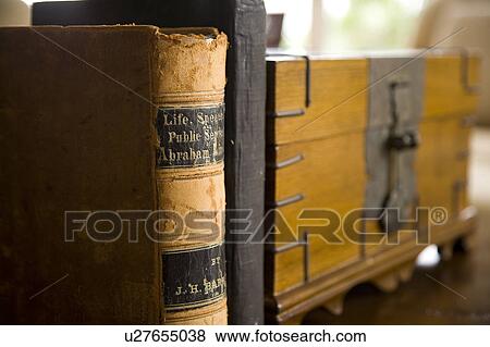 Detail of books next to wooden chest. View Large Photo Image Stock Photo - Detail of books next to wooden chest.. Fotosearch