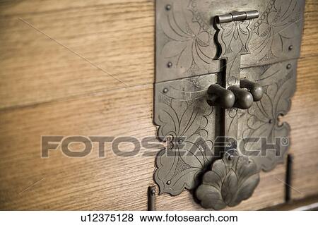 Detail of decorative metal latch View Large Photo Image Stock Photo - Detail of decorative metal latch. Fotosearch