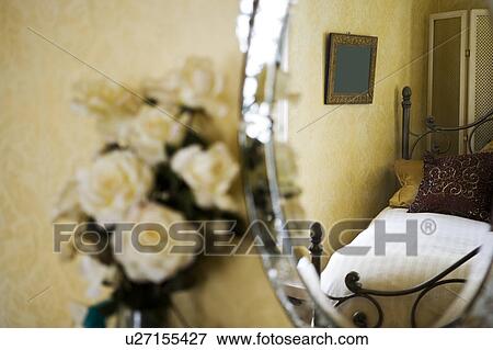 Detail of white roses next to antique vanity mirror. View Large Photo Image Stock Photo - Detail of white roses next to antique vanity mirror.. Fotosearch