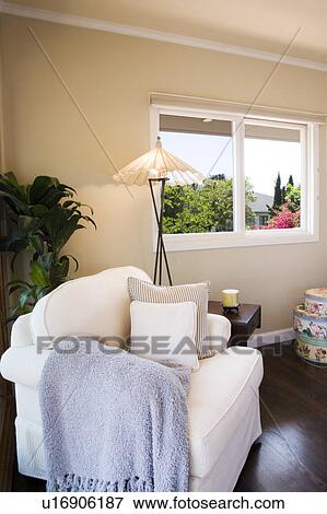 Arm chair by a window View Large Photo Image Stock Photo - Arm chair by a window. Fotosearch