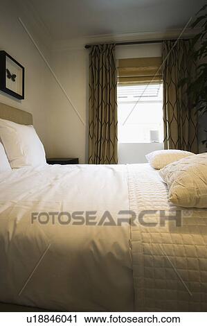 Clean White Bed with Quilt and Pillows View Large Photo Image Stock Image - Clean White Bed with Quilt and Pillows. Fotosearch