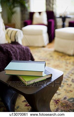 Stock Image - Detail of books on table. Fotosearch