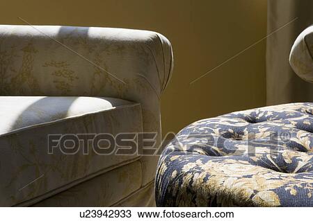 Stock Image - Detail of Chair and Ottoman. Fotosearch