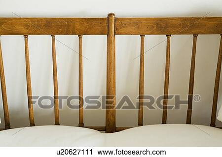 Detail of wood couch with white cushions View Large Photo Image Stock Image - Detail of wood couch with white cushions. Fotosearch