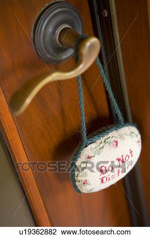 Door handle with do not disturb sign View Large Photo Image Stock Image - Door handle with do not disturb sign. Fotosearch