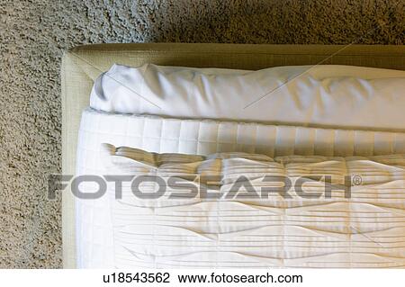 Stack of blankets, sheets, and pillows View Large Photo Image Stock Image - Stack of blankets, sheets, and pillows. Fotosearch