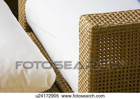 Woven Wicker Patio Furniture with White Cushion View Large Photo Image Stock Photography - Woven Wicker Patio Furniture with White Cushion. Fotosearch