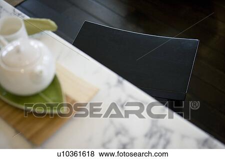 Black bar stool with tea set View Large Photo Image Stock Photo - Black bar stool with tea set. Fotosearch