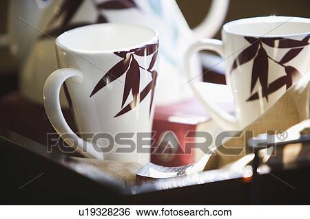 Stock Photograph - Coffee Cups on a Tray. Fotosearch