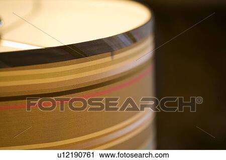 Stock Image - Contemporary striped lampshade. Fotosearch