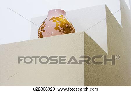 Stock Photo - Contemporary vase sitting. Fotosearch