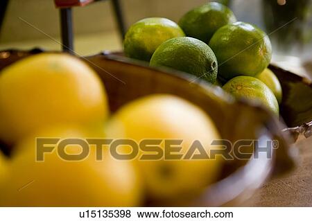 Detail of bowls with limes and soft focused lemons. View Large Photo Image Stock Photo - Detail of bowls with limes and soft focused lemons.. Fotosearch