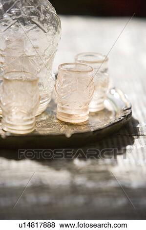 Stock Photo - Dtail of Glass Cups and Pitcher. Fotosearch