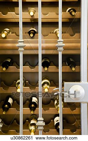 Secured wine rack. View Large Photo Image Stock Image - Secured wine rack.. Fotosearch