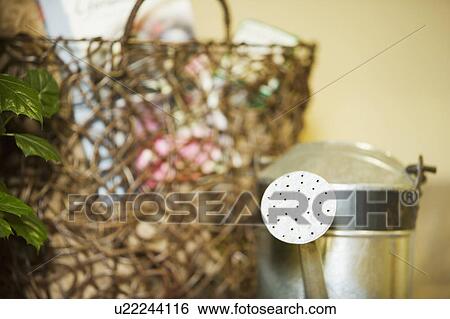 Stock Photograph - Watering can and supplies. Fotosearch