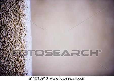Stock Image - Deatil of Stucco on Home Exterior. Fotosearch