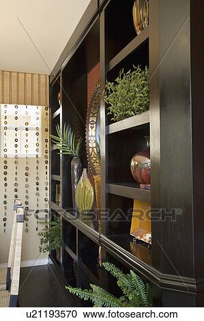 Stock Image - Display Shelf with Pottery. Fotosearch