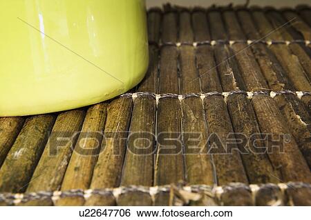 Stock Photograph - Green Pitcher on Wood Mat. Fotosearch