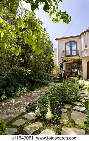 Landscaped Courtyard in Spanish Style Home View Large Photo Image Stock Image - Landscaped Courtyard in Spanish Style Home. Fotosearch