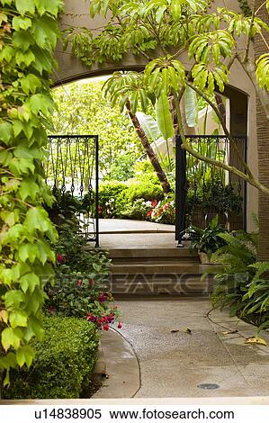 Open-gated archway with foliage View Large Photo Image Stock Photography - Open-gated archway with foliage. Fotosearch